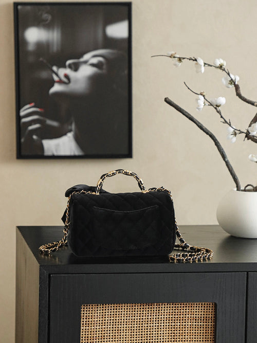 CHanel 25k Black Velvet Handle bag